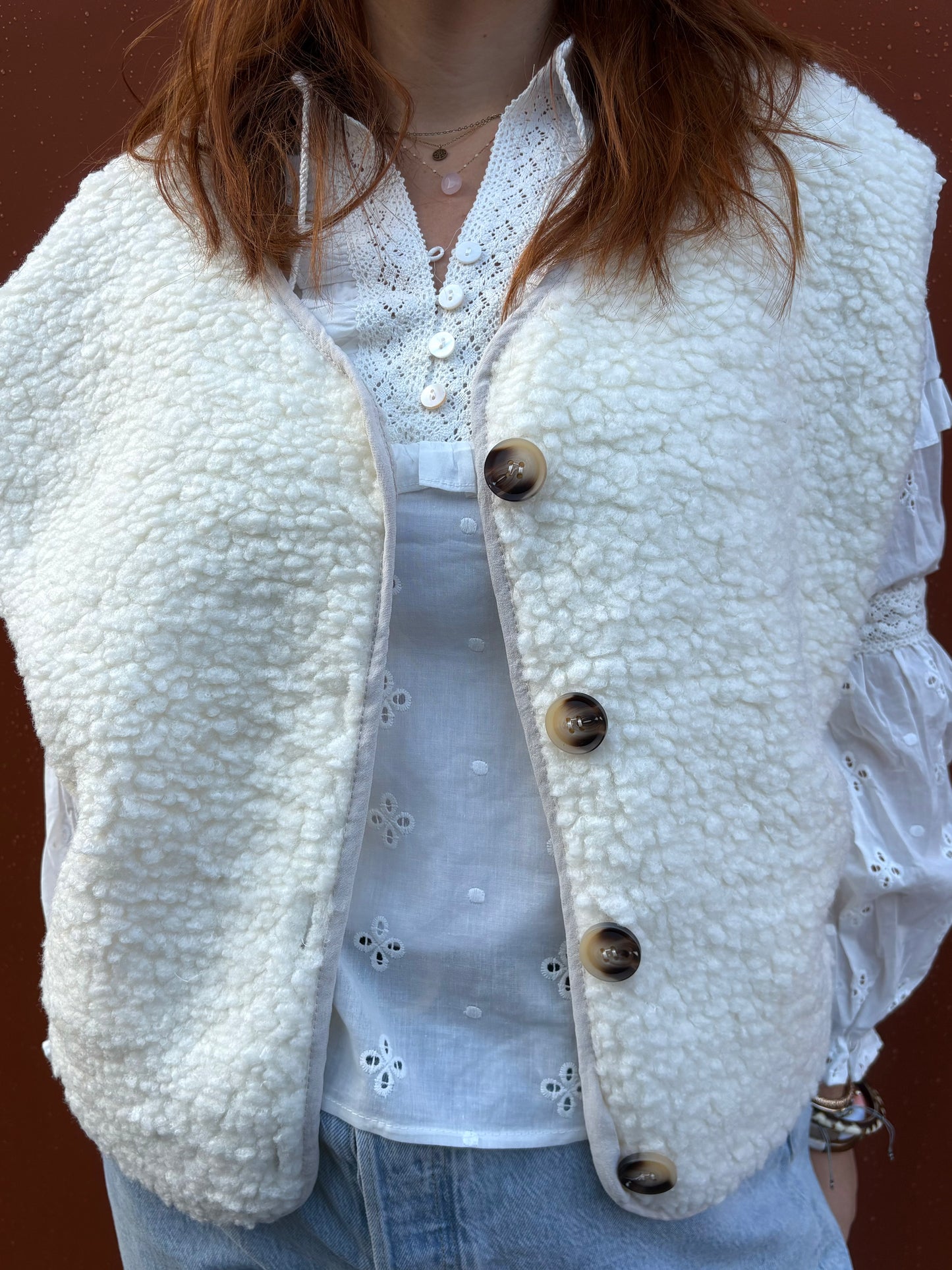 Veste sans manche en moumoute