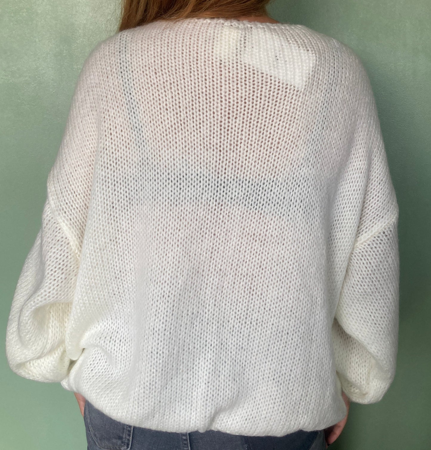 Pull blanc en mohair à noeuds